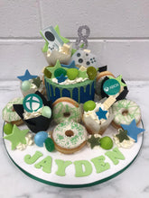 Load image into Gallery viewer, Football Overload cake with cupcakes & doughnuts
