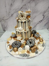 Load image into Gallery viewer, 2 Tier overload cake with Doughnuts