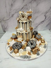 Load image into Gallery viewer, Black & Gold 2 Tier overload cake with Doughnuts
