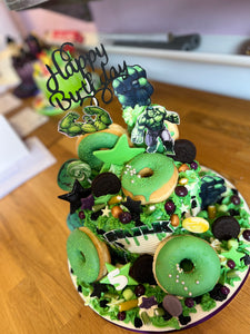 Hulk Marvel Overload cake with cupcakes & doughnuts