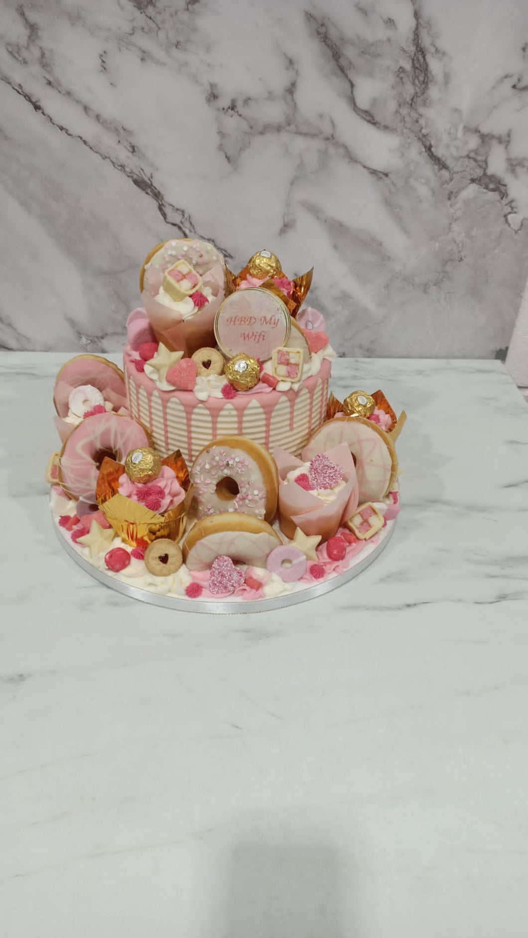 Pink & Gold Overload cake with cupcakes & doughnuts