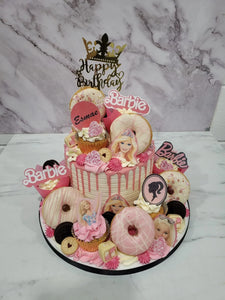 Pink Barbie Overload cake with cupcakes & doughnuts