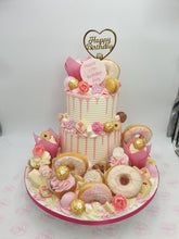 Load image into Gallery viewer, 2 Tier overload cake with Doughnuts
