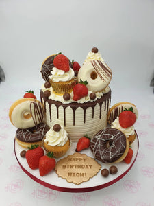 Football Overload cake with cupcakes & doughnuts