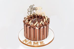 Chocolate Treats Explosion Drip Cake