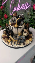 Load image into Gallery viewer, Gold &amp; Black Overload cake with cupcakes &amp; doughnuts
