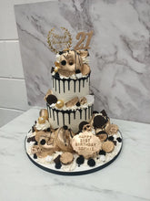 Load image into Gallery viewer, Black &amp; Gold 2 Tier overload cake with Doughnuts
