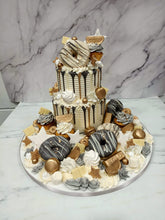 Load image into Gallery viewer, 2 Tier overload cake with Doughnuts
